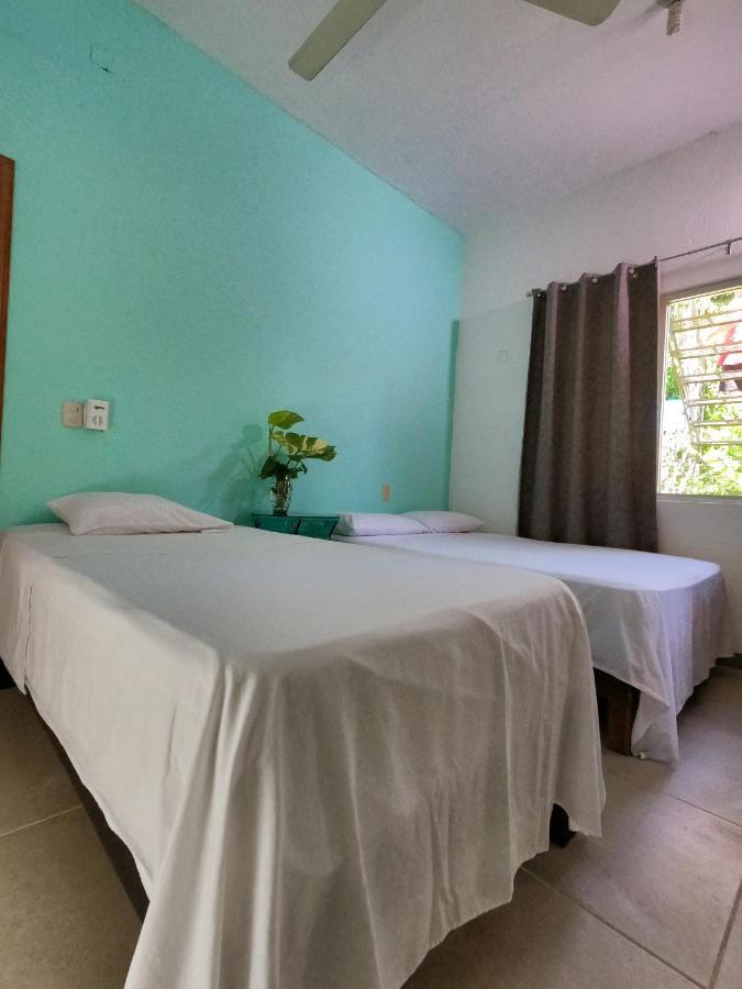 Cama individual en habitación compartida