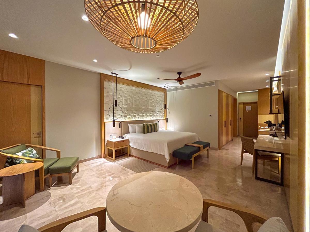 Suite Junior Serenity Club con vistas parciales al mar - Cama extragrande