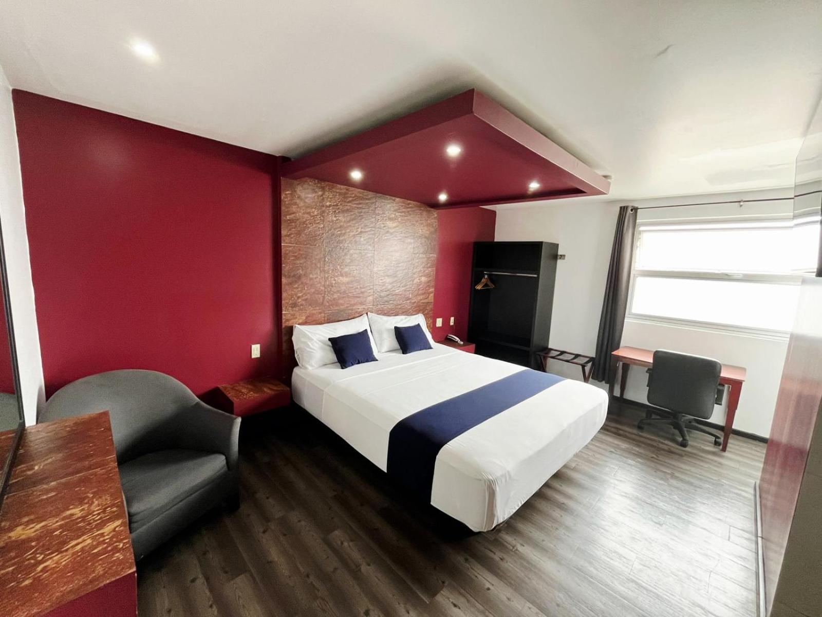 Habitación con cama extragrande.