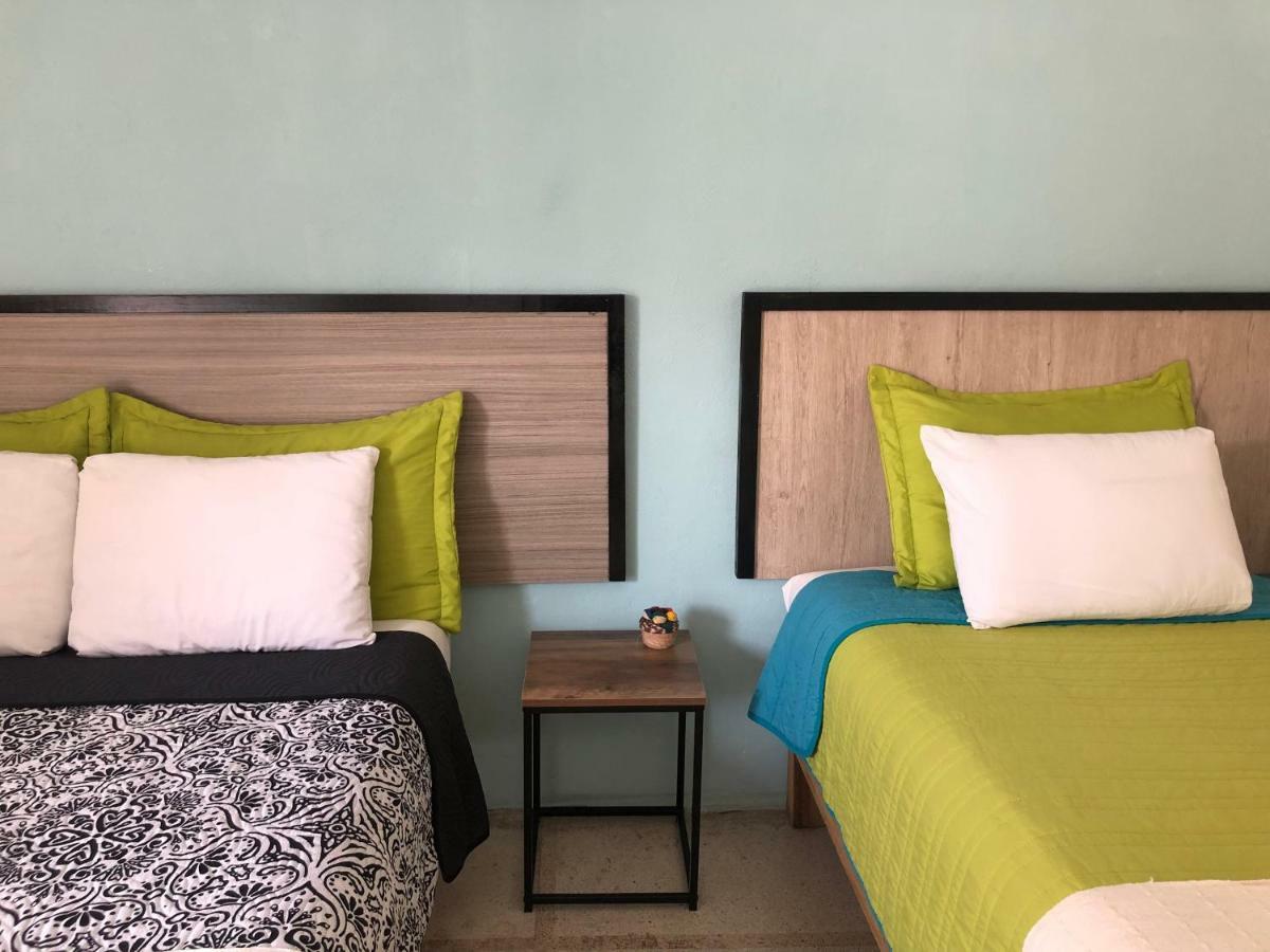 Habitación Triple con baño privado externo