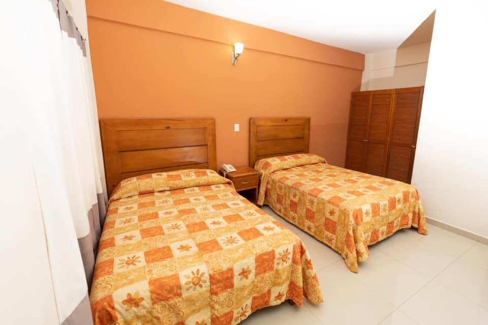Habitación Doble - 2 camas dobles