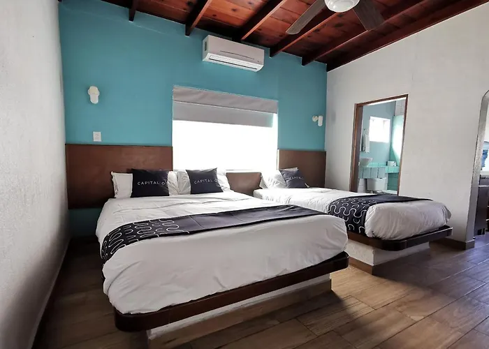 Capital O Hotel América