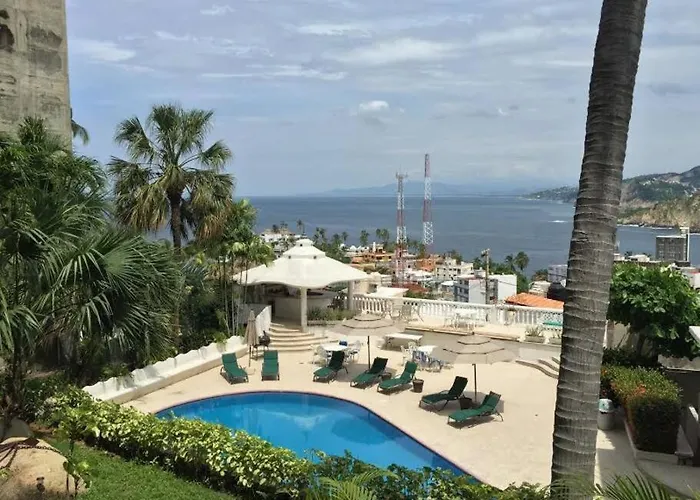 Villa Palmitas acogedor departamento nivel piscina gigante jardines Acapulco